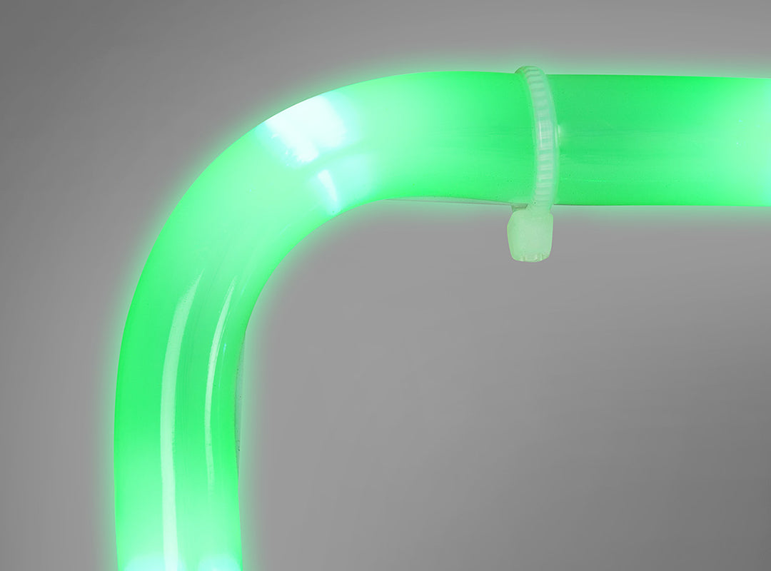 Close-up of clear rope light tubing on the Christow Christmas Train Rope Light, showing green LEDs glowing brightly from within the tubing