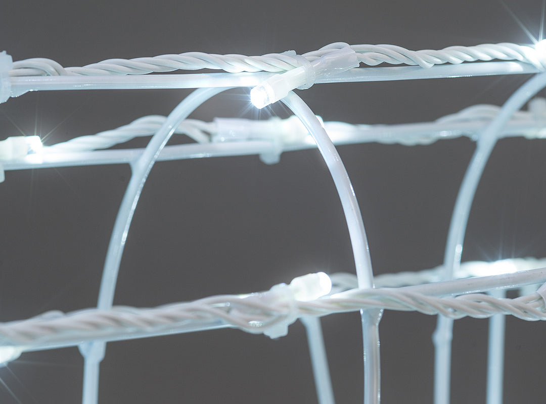 Close-up of the twisted white wire frame on the Christow Light Up White Wire Reindeer & Sleigh, showing twinkling cool white micro LEDs woven through the wire grid against a grey background