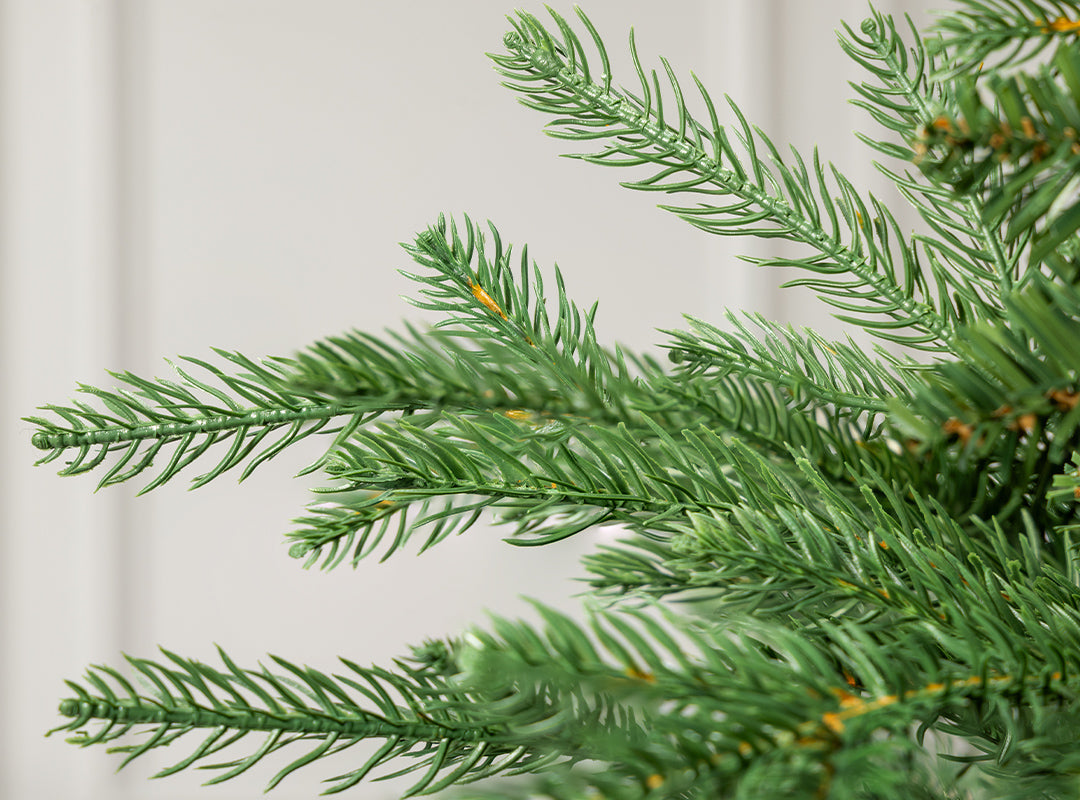 Close-up of flat, glossy PE and PVC tips on the Christow Nordmann Fir Artificial Christmas Tree