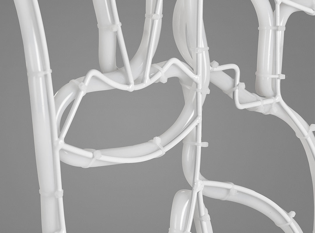 Reverse of the Christow Nutcracker Christmas Rope Light showing the white wire support frame against a grey background
