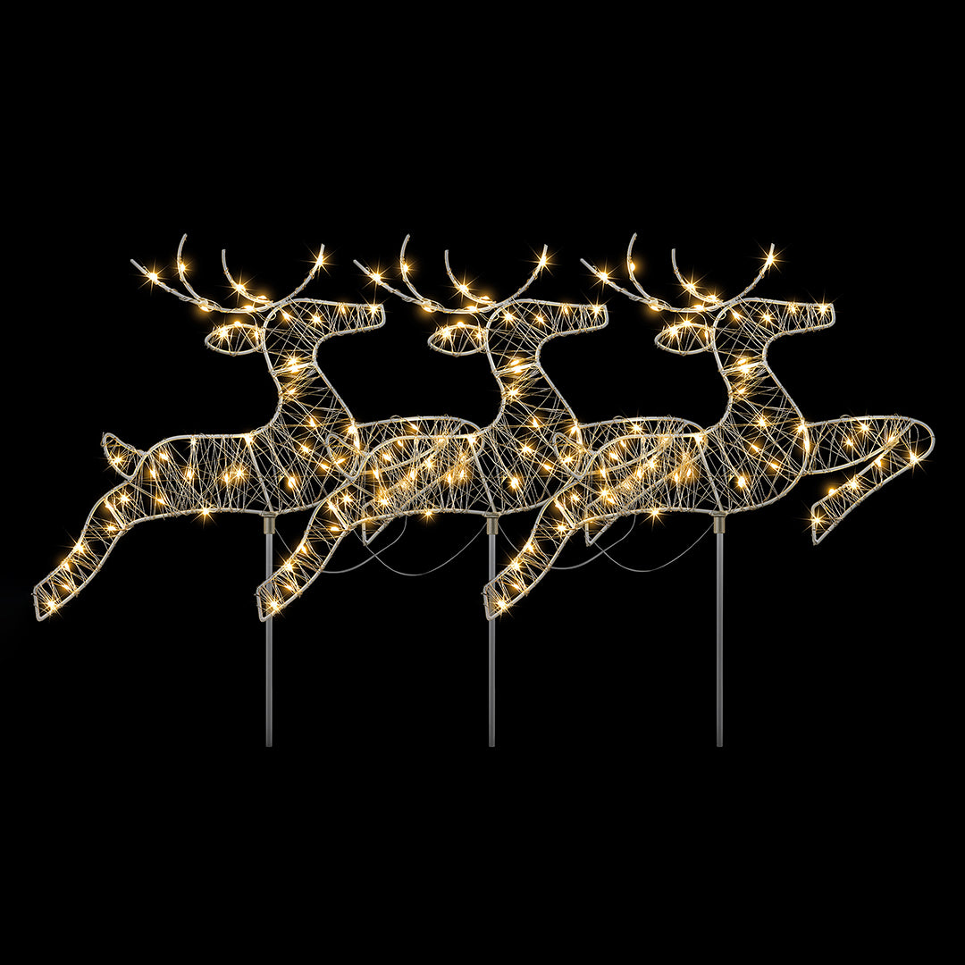 Set of three Christow Micro LED Reindeer Path Lights illuminated by warm white LEDs