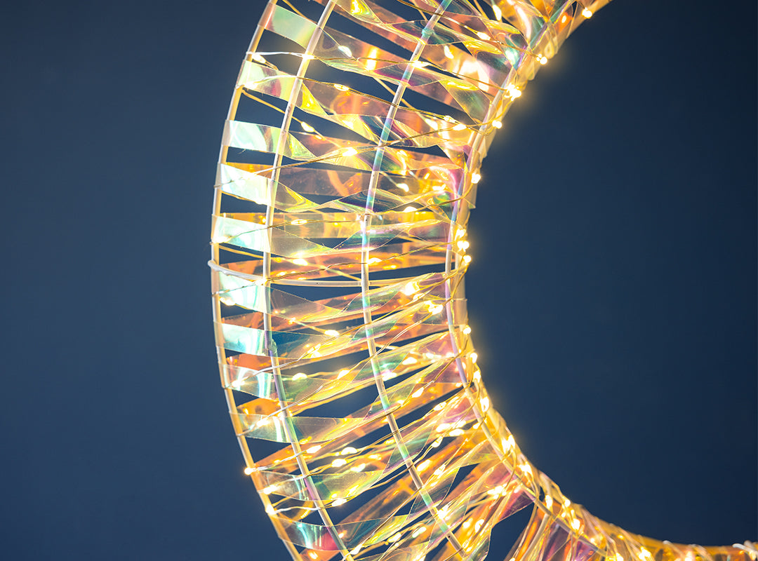 Close-up of warm white micro LEDs illuminating the Christow Iridescent Christmas Wreath