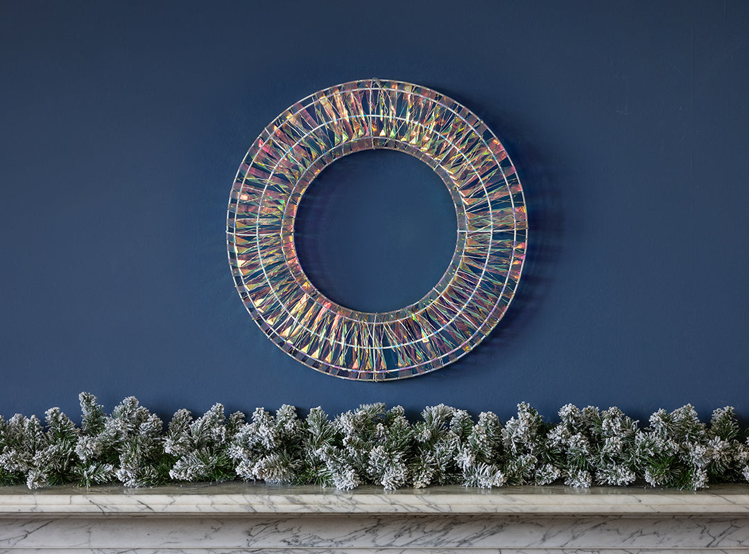 Unlit Christow Iridescent LED Christmas Wreath showing its circular iron frame and iridescent wrap