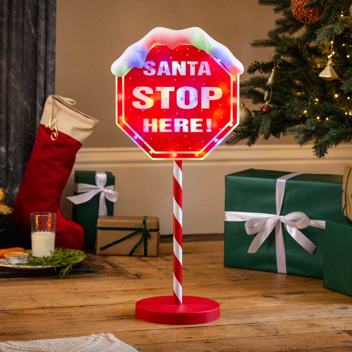 Why Every Yard Needs a Light Up Santa Stop Here Sign This Year